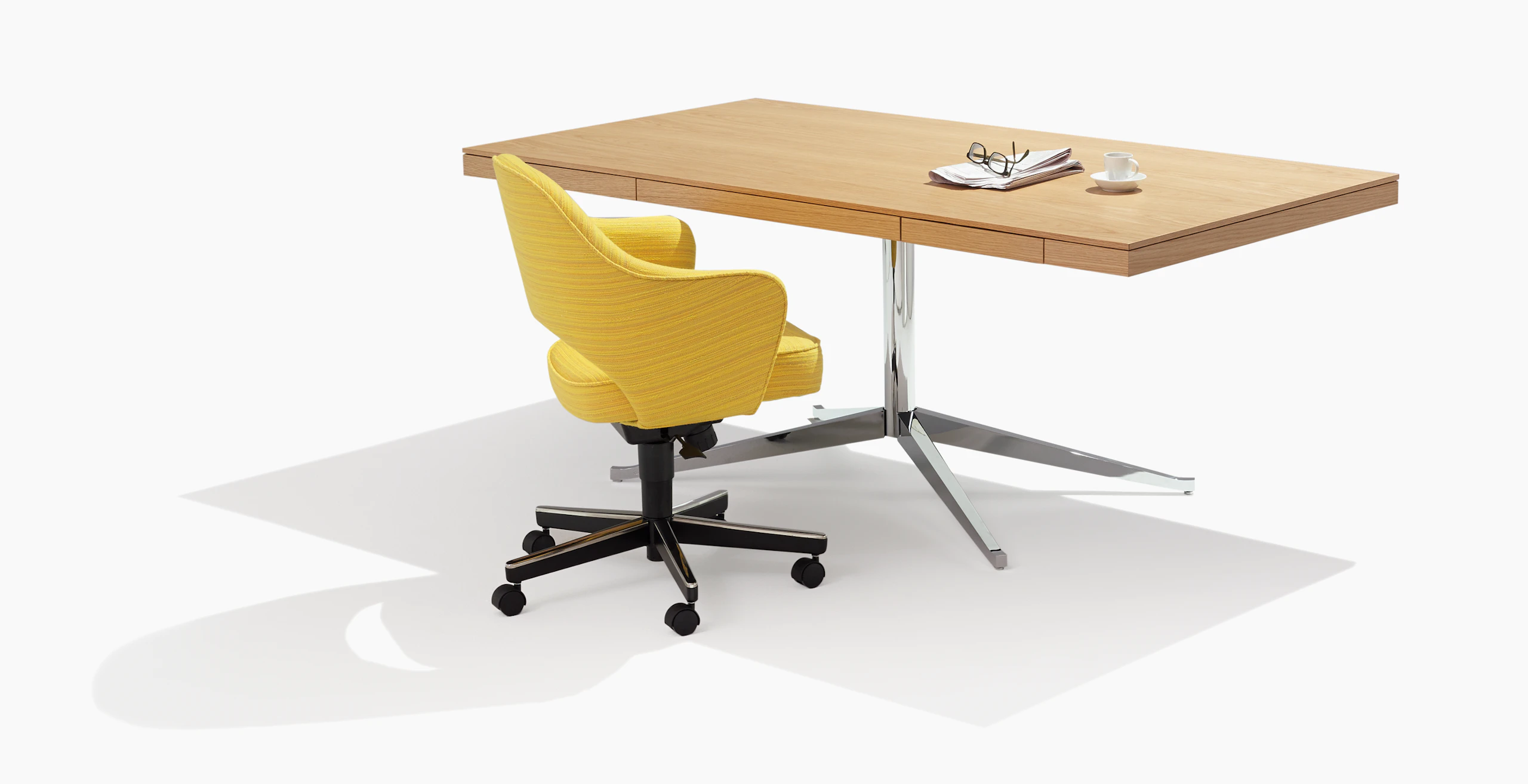 Florence Knoll Executive Desk, Saarinen Executive Chair with Swivel Base, 5-star on Casters