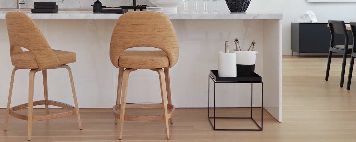 Two Saarinen Executive Stools at a kitchen counter