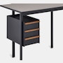 Detail view of drawers in black with walnut pulls on a Mode desk.