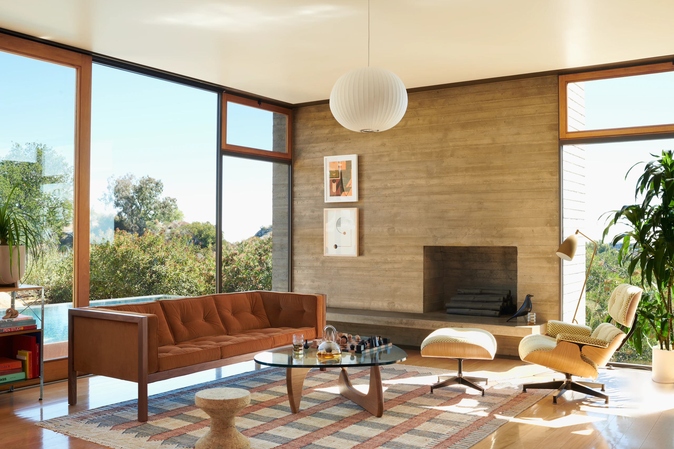 Cube Sofa, Noguchi Table, Eames Lounge and Ottoman, Nelson Bubble Pendant, Ventana Flatweave Jute Rug