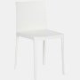 A cream white Elementaire Side Chair viewed from an angle