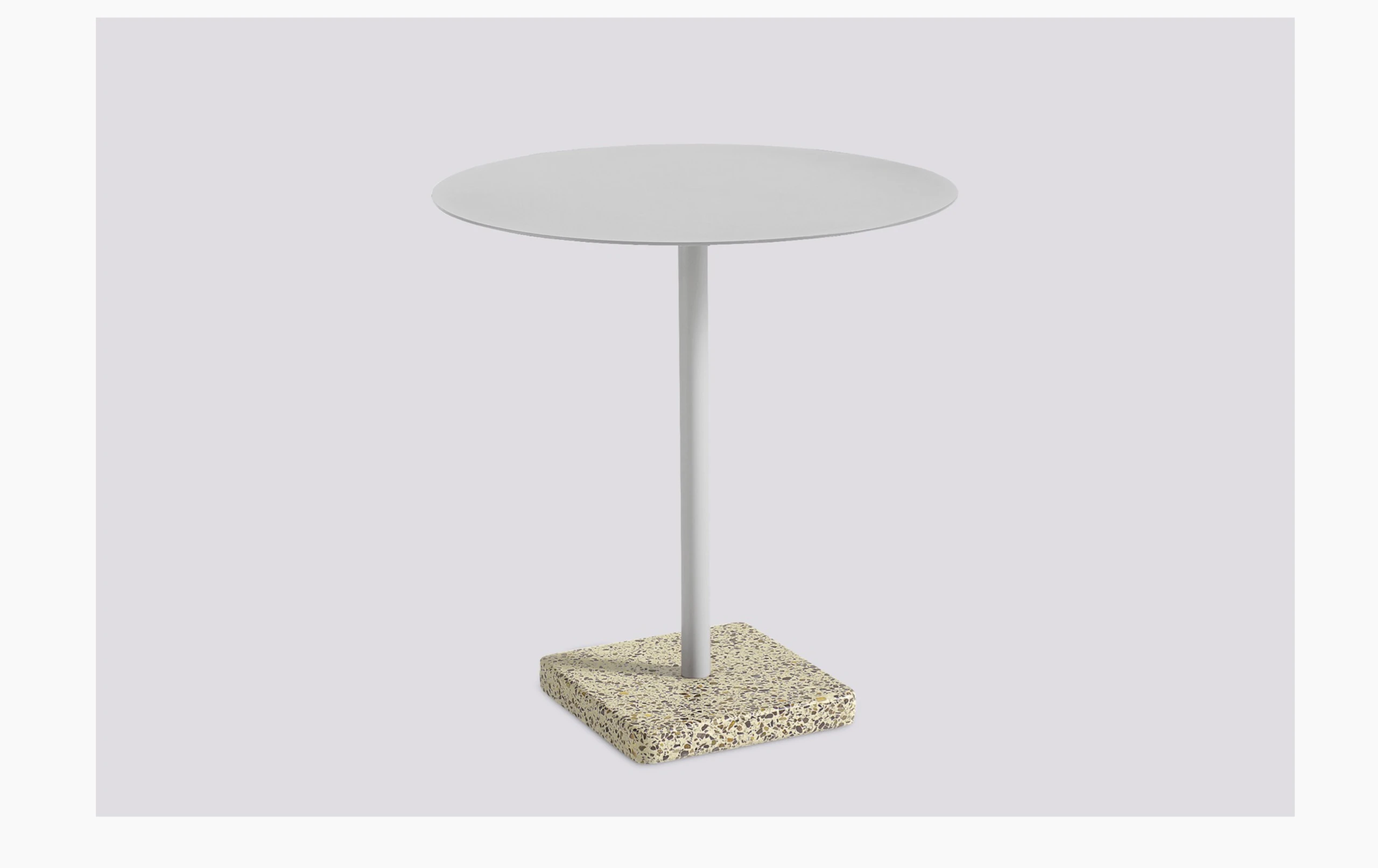 A round Terrazzo Table in light grey with a grey Terrazzo base.