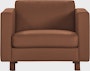 Lispenard Armchair in warm brown ledge leather in 4" legs.