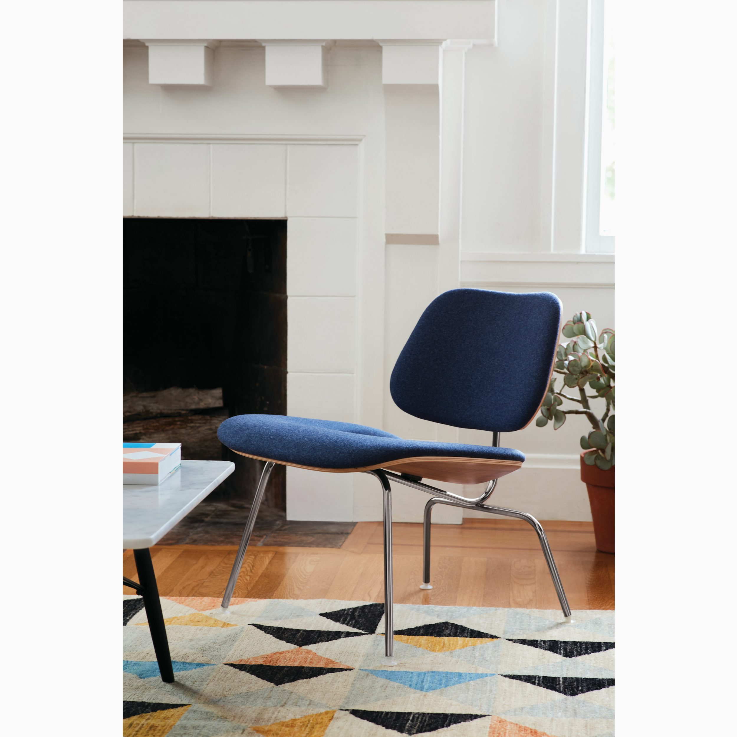 Eames Molded Plywood Lounge Chair Metal Base (LCM), Upholstered Eames Molded Plywood Lounge Chair Metal Base (LCM), Upholstered