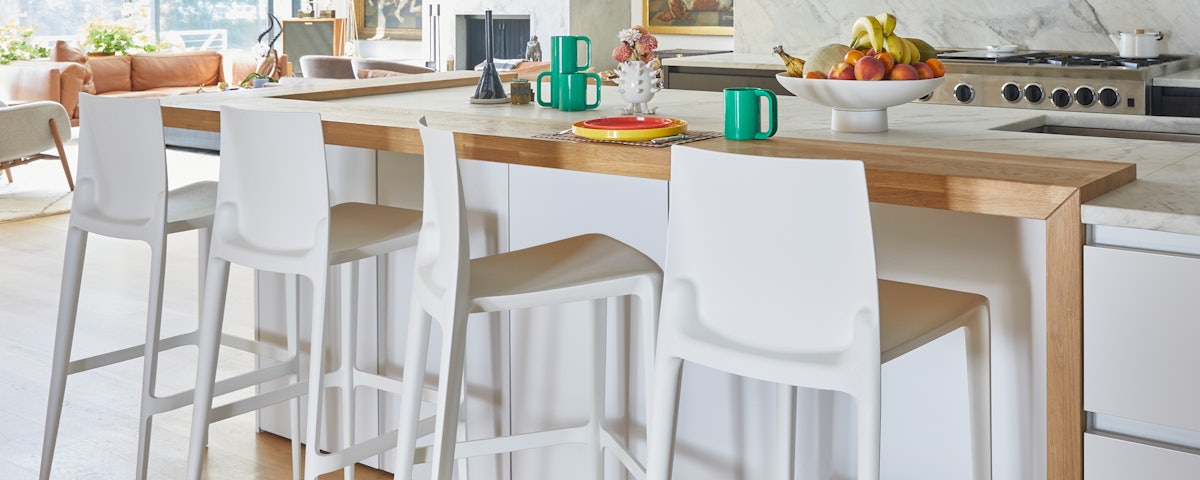 Four Bellini Stools at a kitchen island counter in a kitchen setting