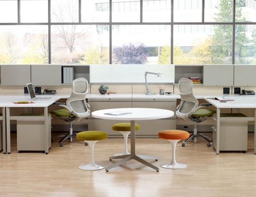 Dividends Horizon workstations with shared overhead storage and Generation chairs