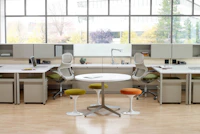 Dividends Skyline workstations with shared overhead storage and Generation chairs