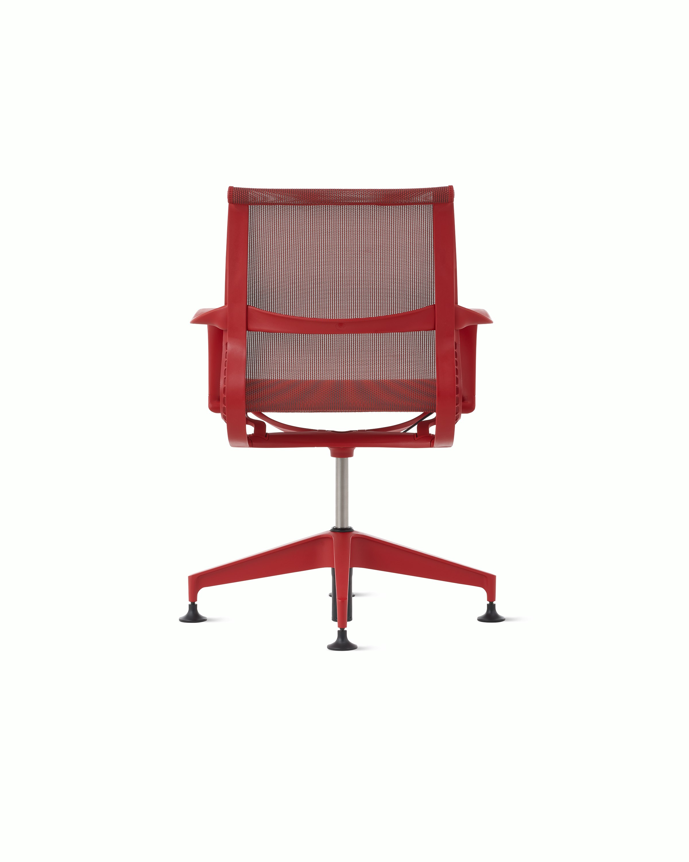 Rear view of a Setu side chair with fixed arms in red.