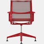 Rear view of a Setu side chair with fixed arms in red.