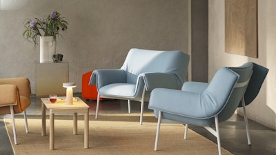 Three Wrap Lounge Chairs by Muuto with light blue and camel upholstery and white steel frames.