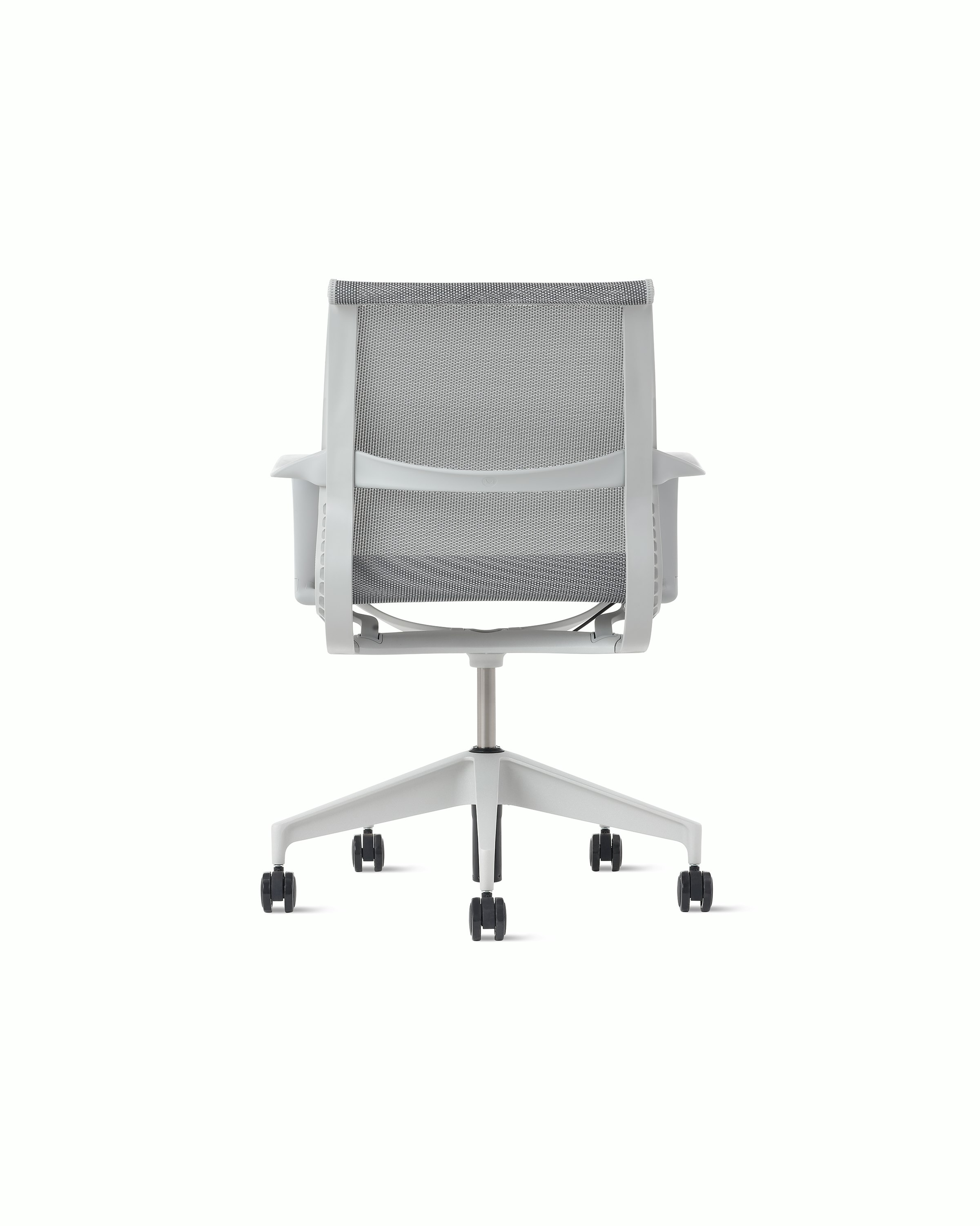 Rear view of a Setu chair in light grey.