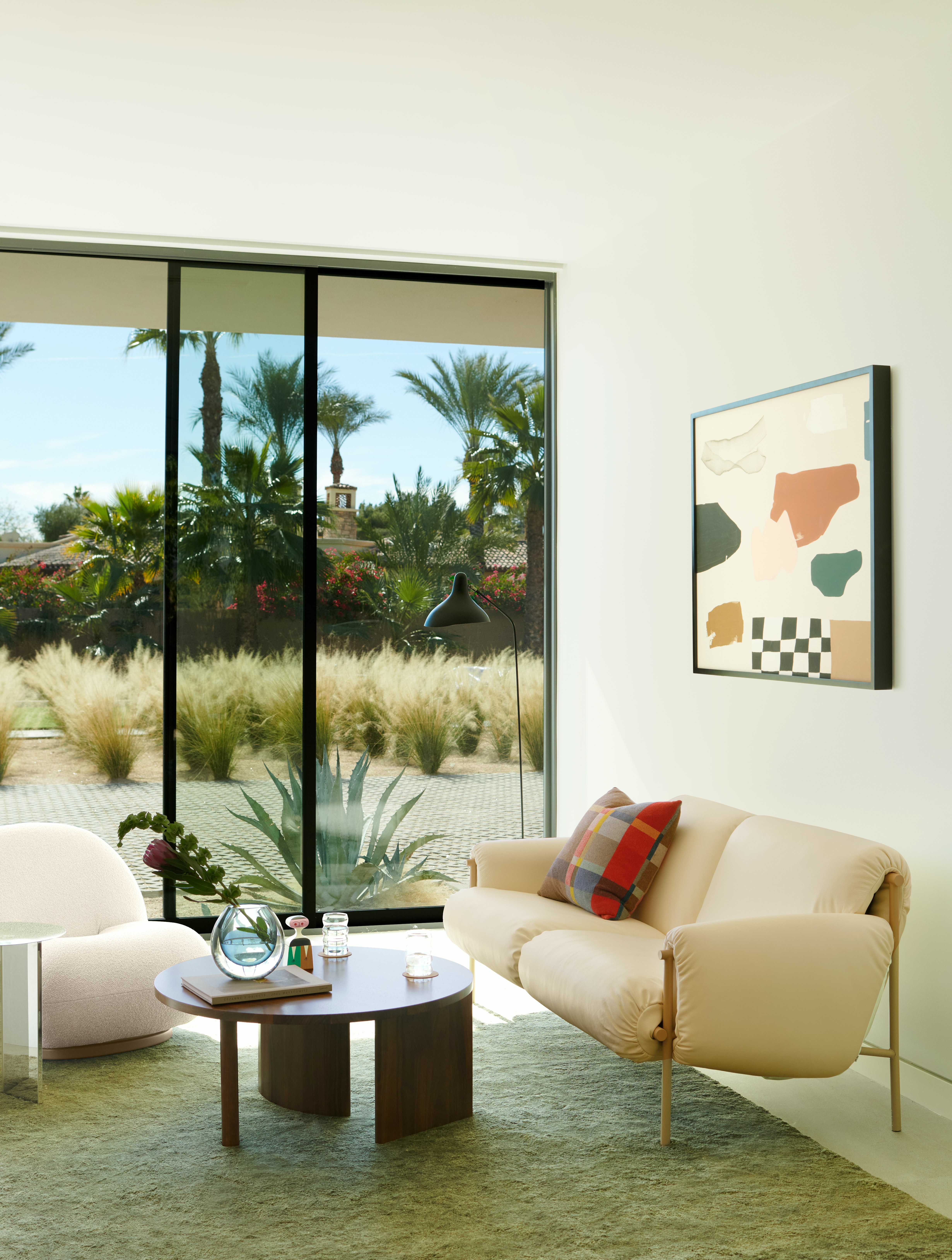 Ami Sofa, Symbol Coffee Table, Ruti Moroccan Wool Rug, Serge Mouille Floor Lamp, Slit Table, Riviera by Karina Bania, Pacha Chair