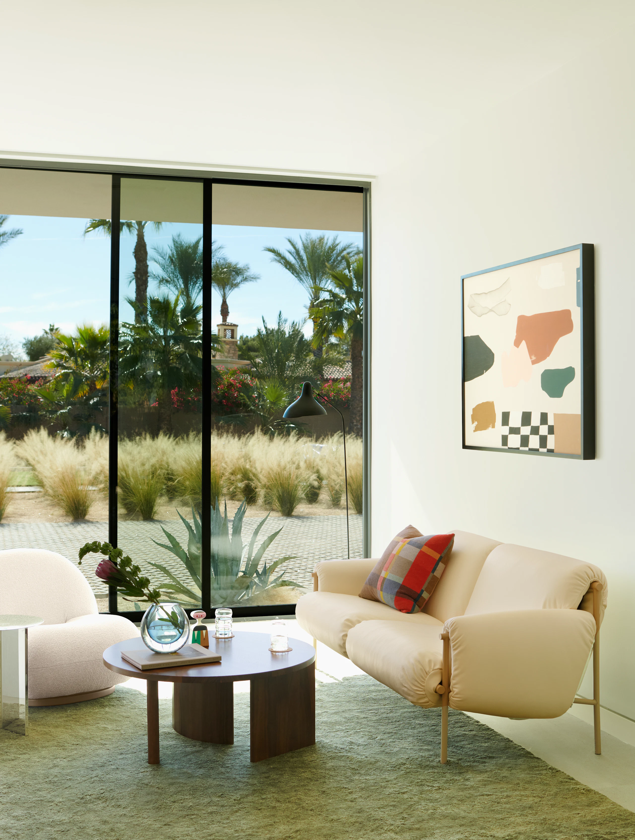 Ami Sofa, Symbol Coffee Table, Ruti Moroccan Wool Rug, Serge Mouille Floor Lamp, Slit Table, Riviera by Karina Bania, Pacha Chair