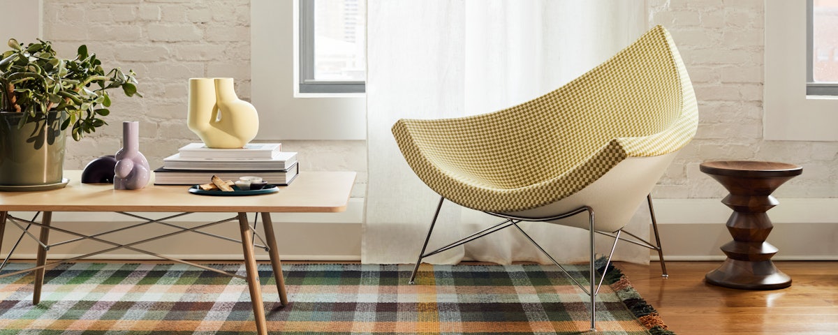 Nelson Coconut Chair and Eames Coffee Table in living room setting