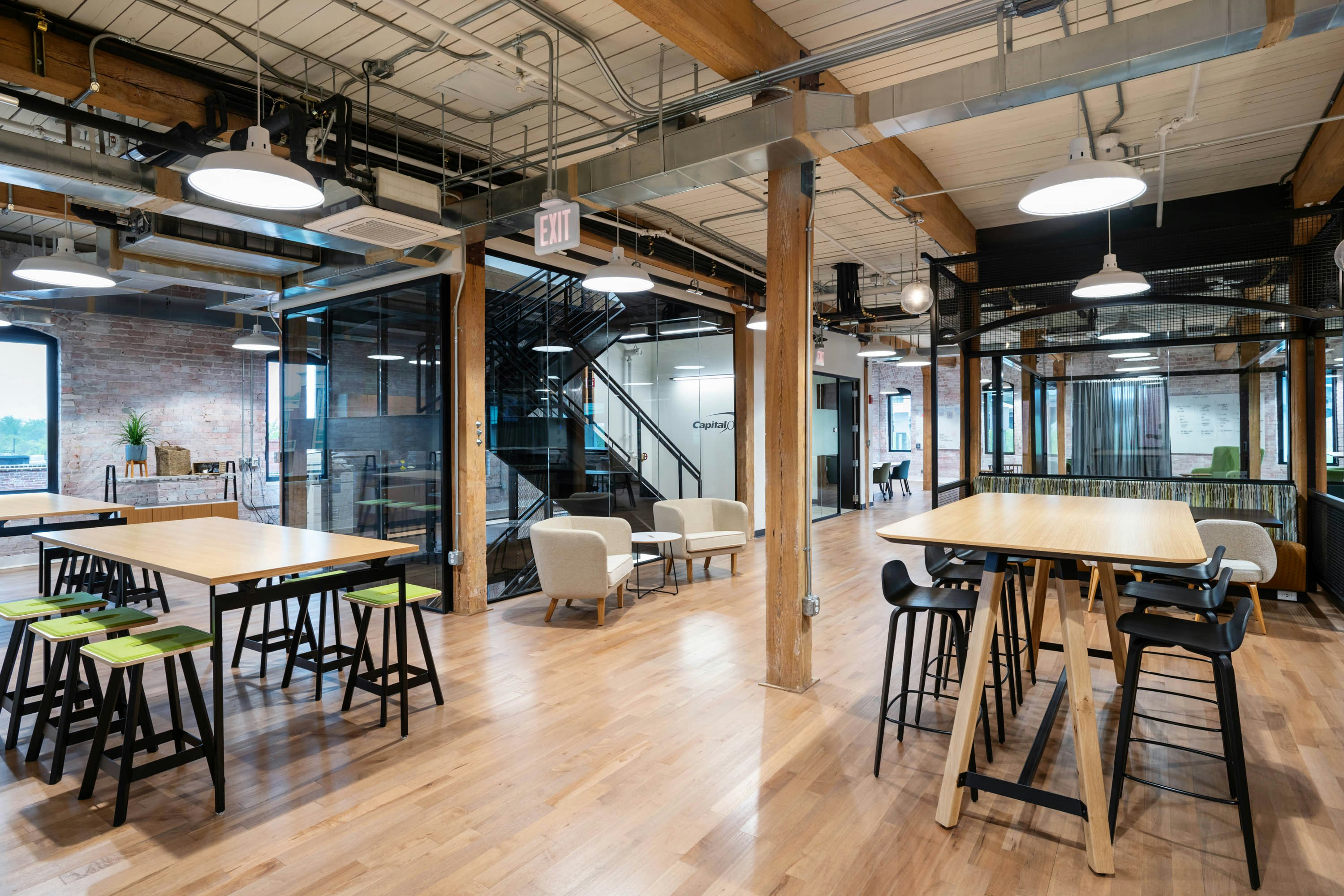 rockwell unscripted tall table easy stools coworking space breakout space antenna table rockwell unscripted club chair