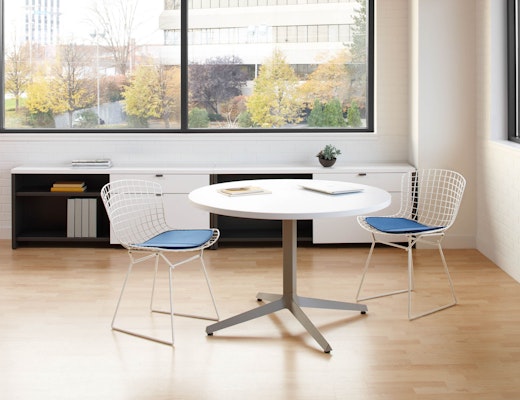 Dividends Horizon low meeting table with Bertoia side chairs