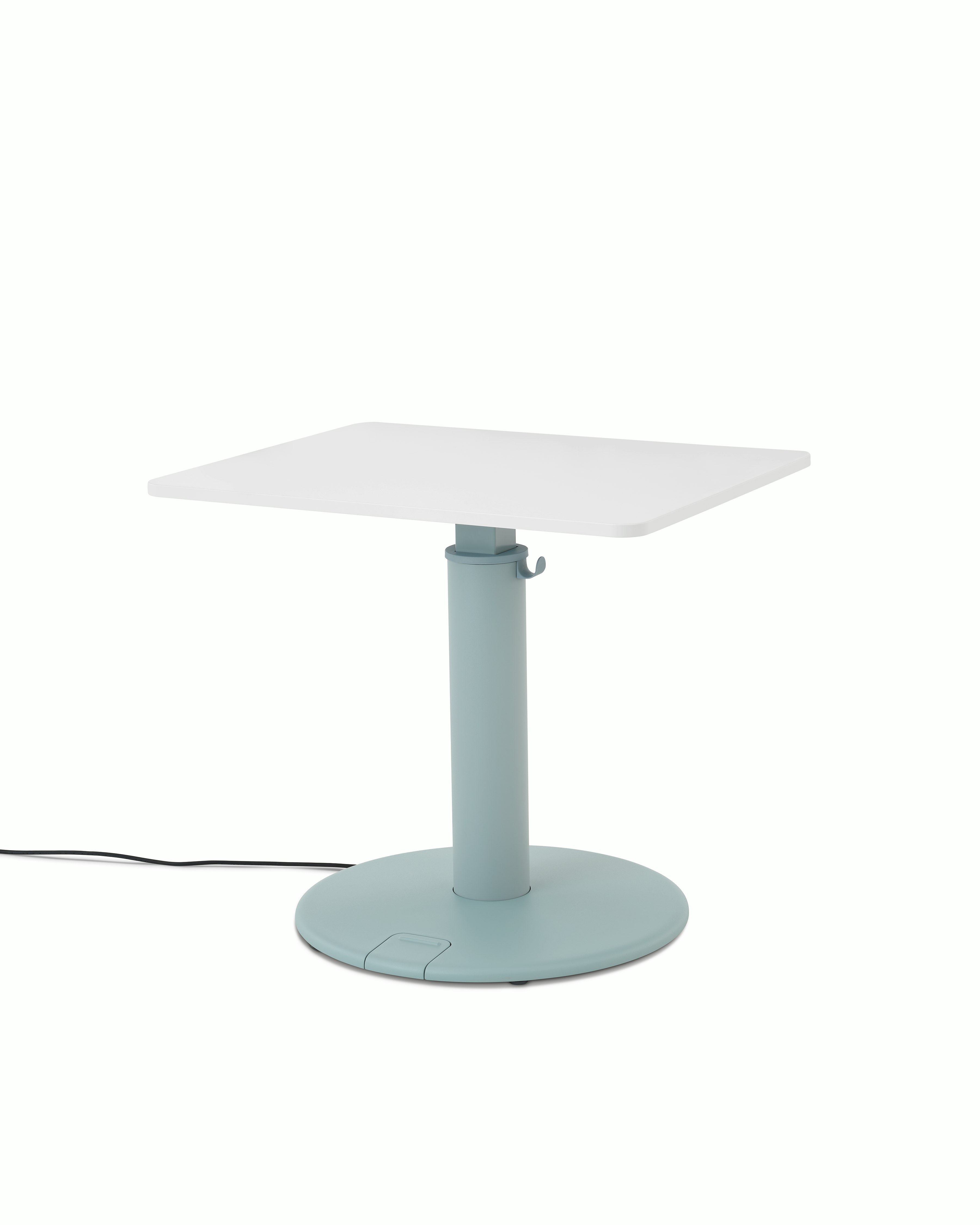OE1 Sit-to-Stand Table with light blue base and white rectangular surface viewed from a front angle.