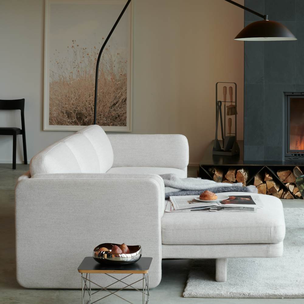 Pastille Sectional Chaise, Noguchi Table, Eames Wire Base Low Table, Cobra Bowl, Venule 5 Way Vase, Sten Floor Lamp, CH25 Easy Chair, Setosa Handknottted Silk Rug, Emma Fireplace Tools, Desert Flora No. 0996 by Cas Friese, JWDA Table Lamp