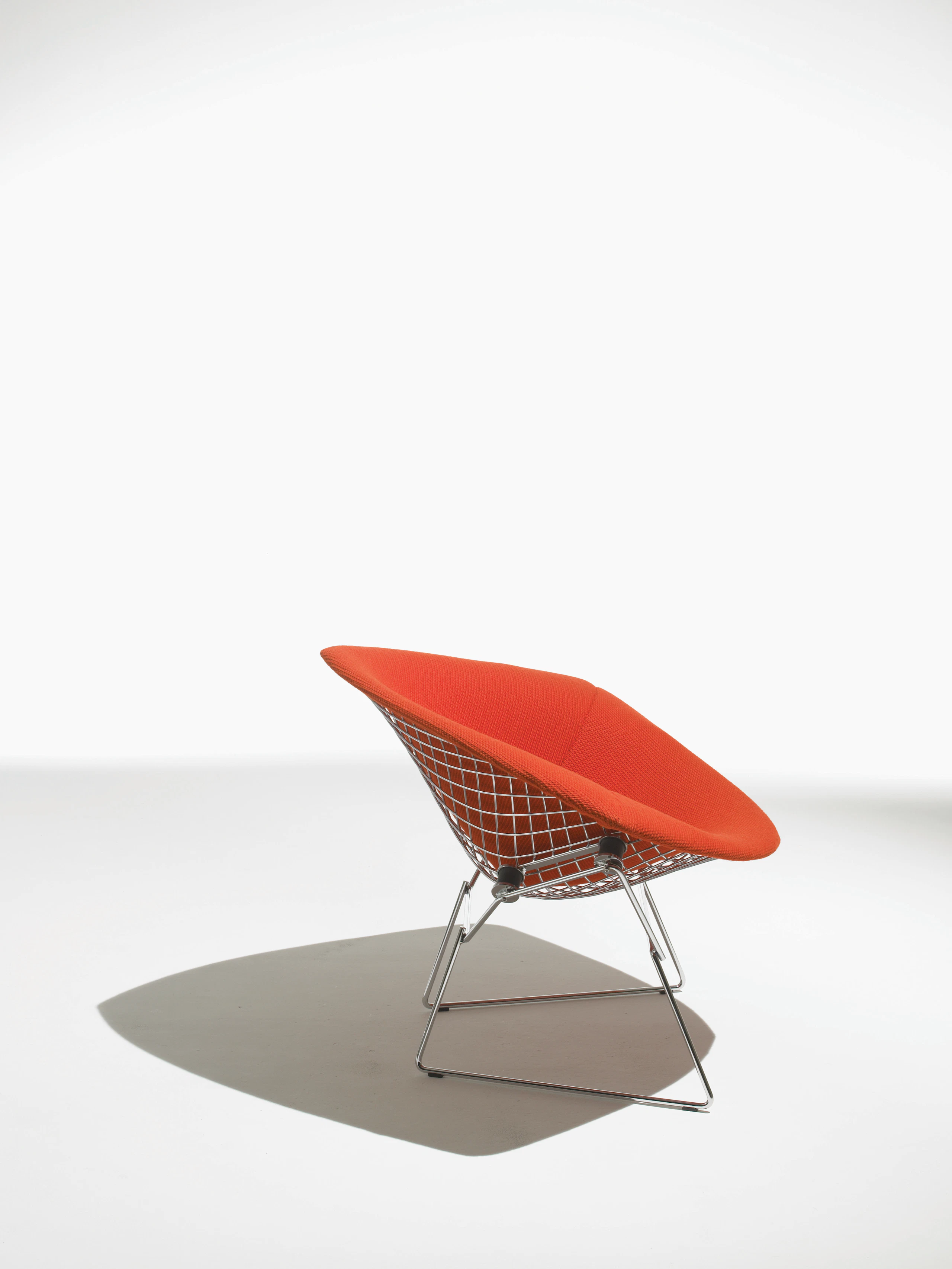 Large Bertoia Diamond Chair in Cato red KnollTextiles seat cover profile view